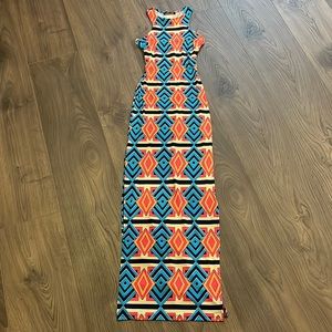 NWOT fun sexy and colorful dress. Size S - keyhole back w slits on both sides